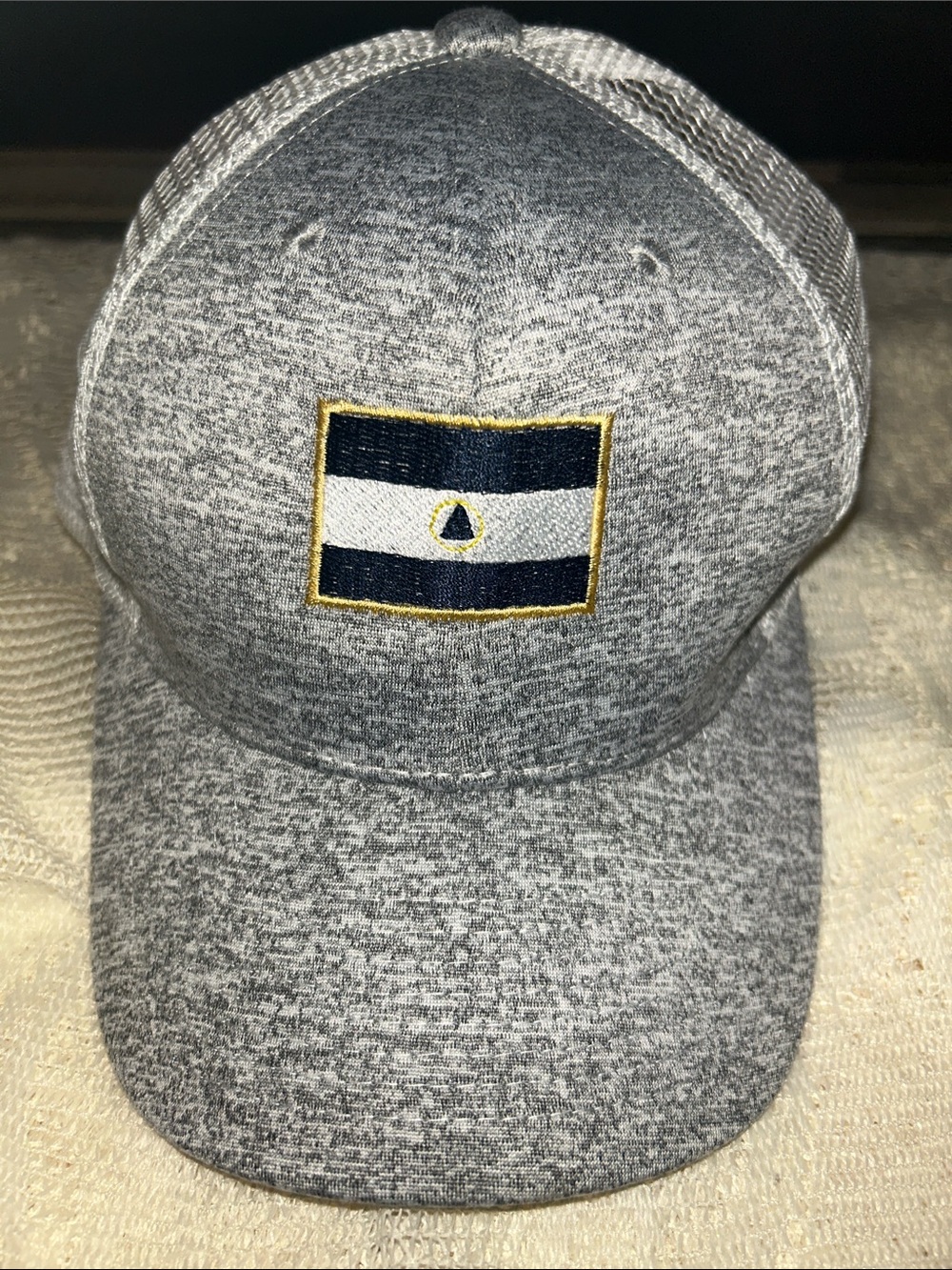 Nicaragua Gray Men's Trucker Cap with Navy & White Patch